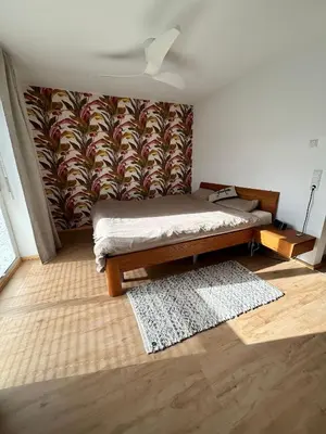 Ein Bett oder Betten in einem Zimmer der Unterkunft Cube - Ferienhaus mit Garten und Terrasse in Eberbach