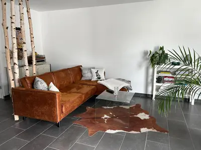 Ein Sitzbereich in der Unterkunft Cube - Ferienhaus mit Garten und Terrasse in Eberbach