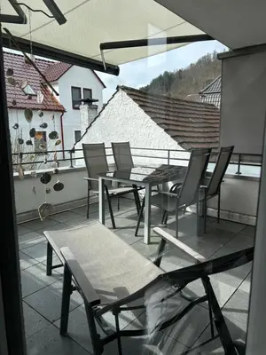 Ein Balkon oder eine Terrasse in der Unterkunft Cube - Ferienhaus mit Garten und Terrasse in Eberbach