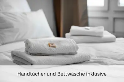 Ein Bett oder Betten in einem Zimmer der Unterkunft Urban Jungle Industríal Parkplatz Balkon Business