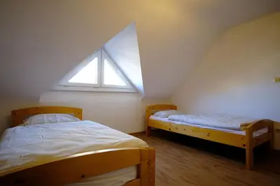 Ein Bett oder Betten in einem Zimmer der Unterkunft Ferienwohnung Dürr