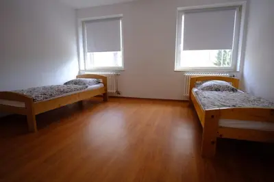 Ein Bett oder Betten in einem Zimmer der Unterkunft Ferienwohnung Dürr