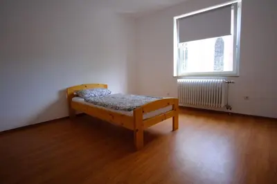 Ein Bett oder Betten in einem Zimmer der Unterkunft Ferienwohnung Dürr