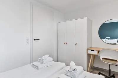 Ein Bett oder Betten in einem Zimmer der Unterkunft DaCasa Apartment zentral SmartTV