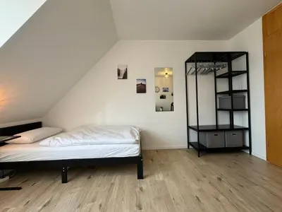 Ein Bett oder Betten in einem Zimmer der Unterkunft Gemütliches Apartment für 2 Personen nahe RaumFabrik - Durlach by Rabe