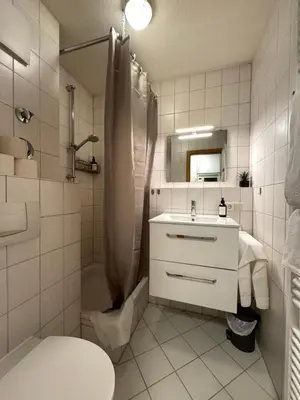 Ein Badezimmer in der Unterkunft Gemütliches Apartment für 2 Personen nahe RaumFabrik - Durlach by Rabe