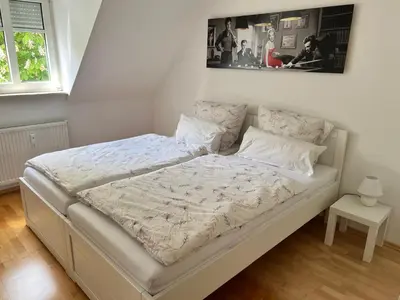 Ein Bett oder Betten in einem Zimmer der Unterkunft moderne 2-Zimmer Wohnung in Rastatt