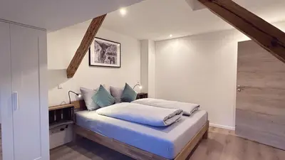 Ein Bett oder Betten in einem Zimmer der Unterkunft Heimatliebe Wohnung FÜNF