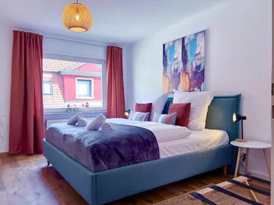 Ein Bett oder Betten in einem Zimmer der Unterkunft UPPER ROOM Apartment im Zentrum