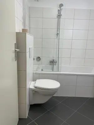 Ein Badezimmer in der Unterkunft Alice Holiday Apartment