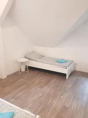 Ein Bett oder Betten in einem Zimmer der Unterkunft Apartments für Monteure - Heilbronn