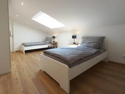 Ein Bett oder Betten in einem Zimmer der Unterkunft Dorfliebe Winterkasten
