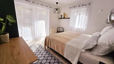 Ein Bett oder Betten in einem Zimmer der Unterkunft Ferienwohnungen Krüger 'Apartment Marina'
