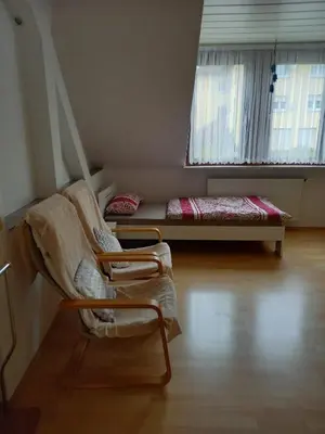 Ein Bett oder Betten in einem Zimmer der Unterkunft Ferienwohnung Enz, 3 OG.