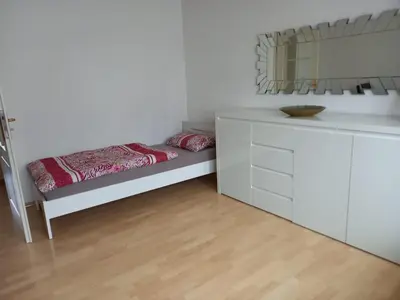 Ein Bett oder Betten in einem Zimmer der Unterkunft Ferienwohnung Enz, 3 OG.