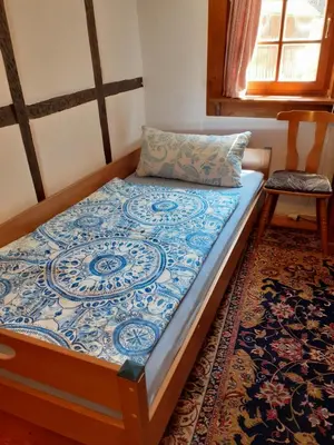 Ein Bett oder Betten in einem Zimmer der Unterkunft Bad Wimpfen Altstadt - ruhige, private Unterkunft