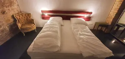 Ein Bett oder Betten in einem Zimmer der Unterkunft Loft im Szeneviertel Mannheims