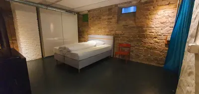 Ein Bett oder Betten in einem Zimmer der Unterkunft Loft im Szeneviertel Mannheims