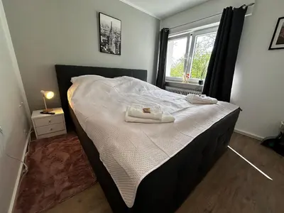 Ein Bett oder Betten in einem Zimmer der Unterkunft Premium Apartments Schwetzingen, Heidelberg, Speyer