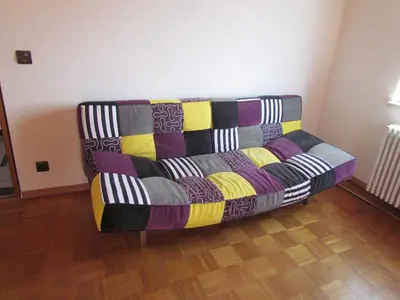 Ein Sitzbereich in der Unterkunft Ferienwohnung am Heuchelberg