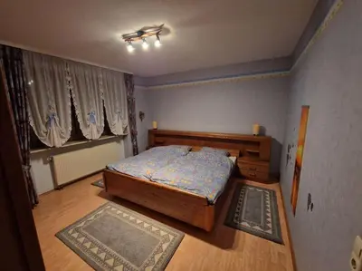 Ein Bett oder Betten in einem Zimmer der Unterkunft FeWo Kirchgässle