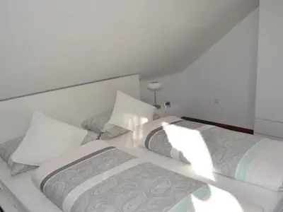 Ein Bett oder Betten in einem Zimmer der Unterkunft Pension Sonnenberg Comfortable holiday residence