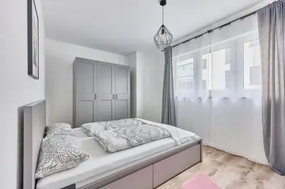 Ein Bett oder Betten in einem Zimmer der Unterkunft Elegantes 2 Zimmer Apartment Top Lage