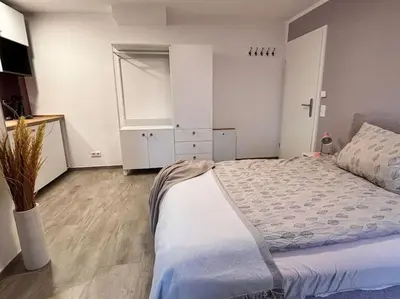 Ein Bett oder Betten in einem Zimmer der Unterkunft Gemütlich Mitten in Neu-Isenburg