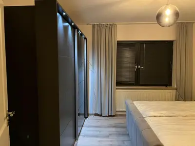 Ein Bett oder Betten in einem Zimmer der Unterkunft Moderne Ferienwohnung in Dilsberg
