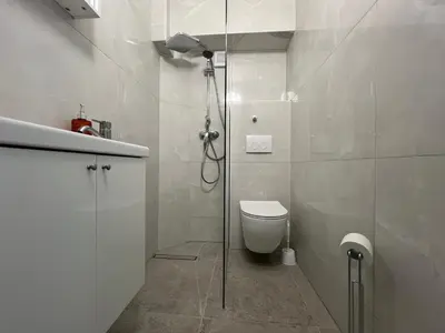 Ein Badezimmer in der Unterkunft Mieterlux Frankfurt Heusenstamm 46
