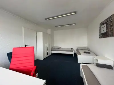 Ein Bett oder Betten in einem Zimmer der Unterkunft Mieterlux Frankfurt Heusenstamm 46