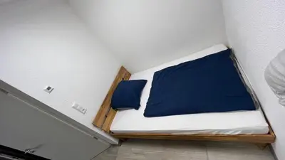 Ein Bett oder Betten in einem Zimmer der Unterkunft Gemütlich, ländlich, stadtnah