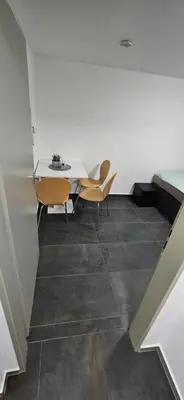 Ein Sitzbereich in der Unterkunft Unterkunft Mainz Laubenheim