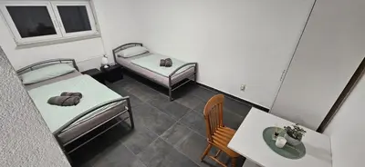 Ein Bett oder Betten in einem Zimmer der Unterkunft Unterkunft Mainz Laubenheim