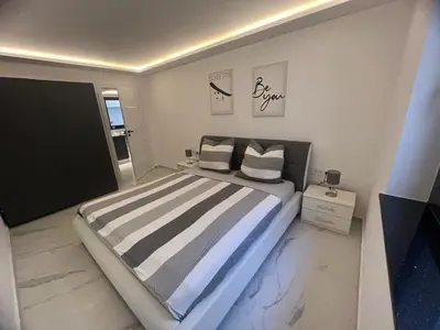 Ein Bett oder Betten in einem Zimmer der Unterkunft Schöne Neubauwohnung nähe Frankfurt und Flughafen