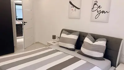 Ein Bett oder Betten in einem Zimmer der Unterkunft Schöne Neubauwohnung nähe Frankfurt und Flughafen