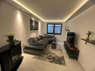 Ein Sitzbereich in der Unterkunft Schöne Neubauwohnung nähe Frankfurt und Flughafen