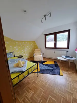 Ein Bett oder Betten in einem Zimmer der Unterkunft Wohnung Widdern