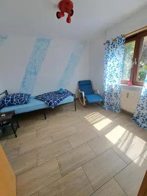 Ein Sitzbereich in der Unterkunft Wohnung Widdern