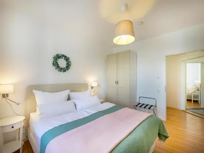 Ein Bett oder Betten in einem Zimmer der Unterkunft FLAIR Homes - Design Apartments with Smart-TV, Self Check-in & Free Parking