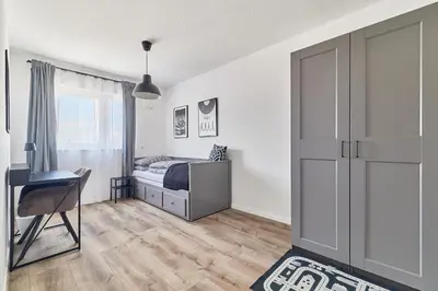 Ein Bett oder Betten in einem Zimmer der Unterkunft Neubau Luxus Penthouse - Netflix - BBQ