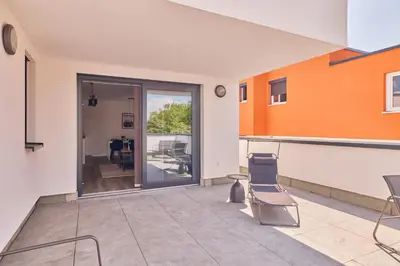 Ein Sitzbereich in der Unterkunft Neubau Luxus Penthouse - Netflix - BBQ