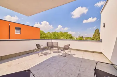Ein Balkon oder eine Terrasse in der Unterkunft Neubau Luxus Penthouse - Netflix - BBQ