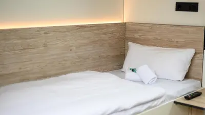 Ein Bett oder Betten in einem Zimmer der Unterkunft Roatel Gimbsheim B9 my-roatel-com