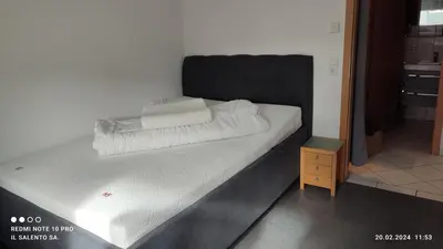Ein Bett oder Betten in einem Zimmer der Unterkunft gemütliche 2 Zimmer Wohnung in Markgröningen