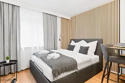 Ein Bett oder Betten in einem Zimmer der Unterkunft Nähe Hauptbahnhof, Kingsize Bett, H-Office, Netflix
