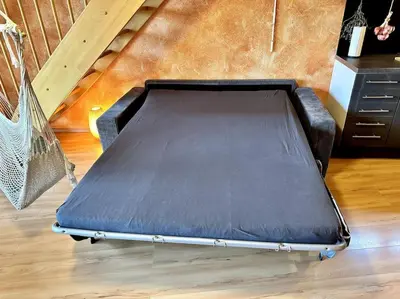 Ein Bett oder Betten in einem Zimmer der Unterkunft Apartment Joelle mit Sauna, Schwimmteich und Gym