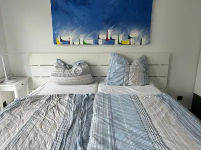 Ein Bett oder Betten in einem Zimmer der Unterkunft Business Apartment Nähe Uni Kaiserslautern
