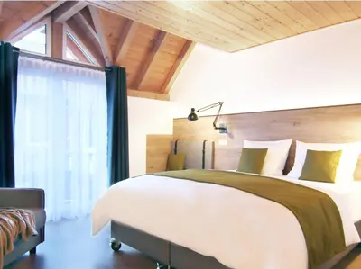 Ein Bett oder Betten in einem Zimmer der Unterkunft Weingut-Gästehaus Buchert