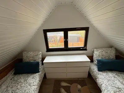 Ein Bett oder Betten in einem Zimmer der Unterkunft Hidden Cottage Odenwald